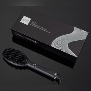 ghd Glide Black professional hair straightener hot brush, smooths dry hair